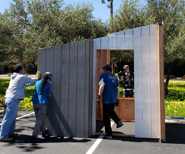 Menlo Church volunteers assembling an Emergency Sleeping Cabin. 