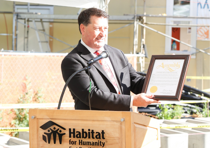 State Assembly Member giving Habitat an award