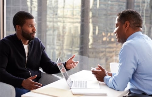 Two men in counseling office