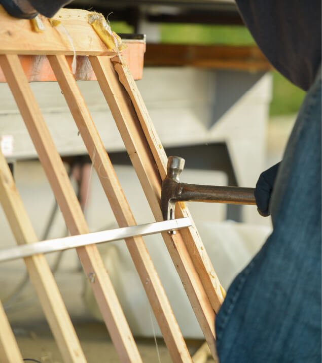 hammer on wooden frame